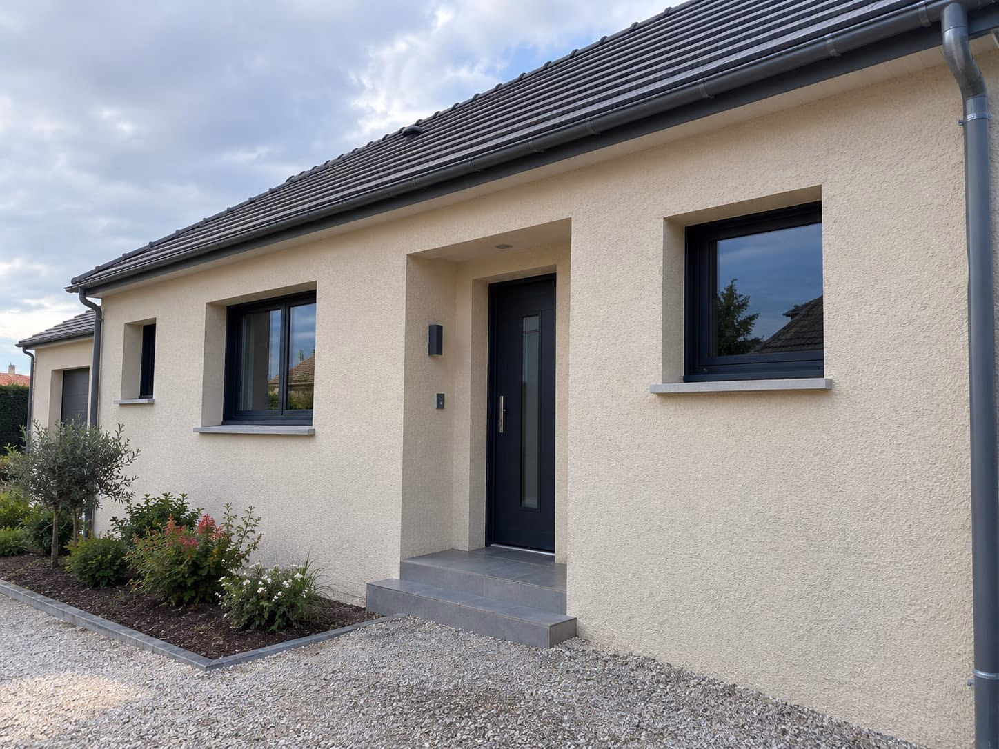 Maison à la façade enduite, rénovation extérieure terminée